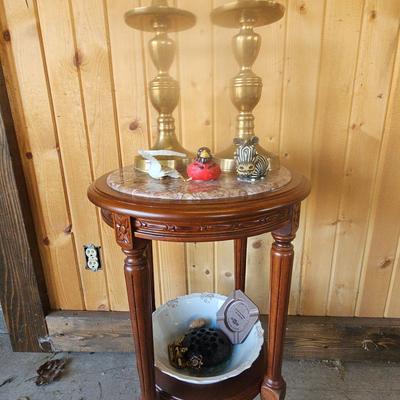 Pink Marble Top Table With Large Brass Candle Holders And Contents