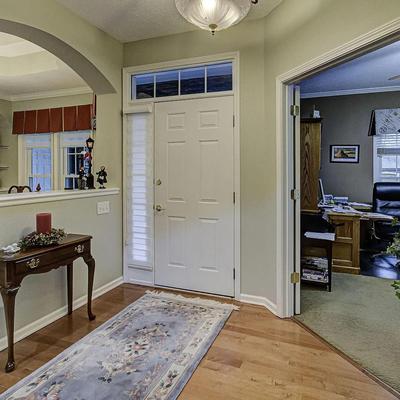 Cute little entry table and wool rug