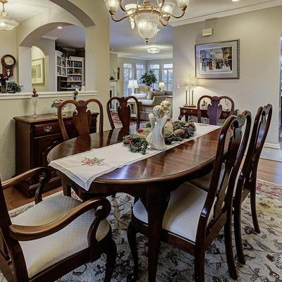 Dining room table with leaf and pads, 6 chairs, and server
