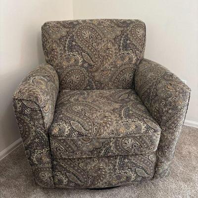 Lot #70 - Best Home Furnishings Swivel Glider Chair - Paisley Pattern