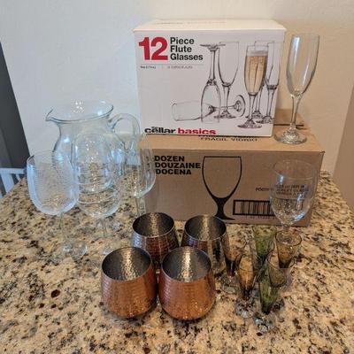 Lot #22 - Home Bar Essentials Lot - Glassware, Pitcher & Drink Covers.