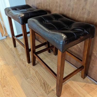 Lot #12 - Set of Two Bar Stools - Black Upholstered with Wood Frame.
