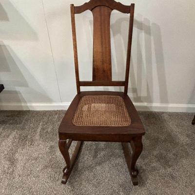 Lot #84 - Antique Rocking Chair - Wooden Cane Seat.