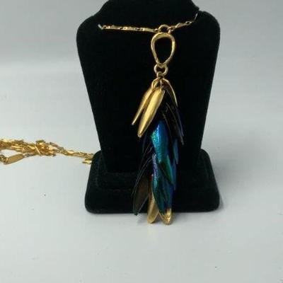 Beetle wings and gold