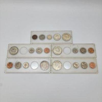  1964 (full) 1967 (missing quarter) 1968 (missing quarter) (half dollar is 1967) 1969 (missing quarter) (2)