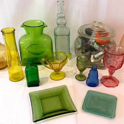 Menagerie Of Colored Glass Items Including A Planters Peanut Jar Full Of Cookie Cutters