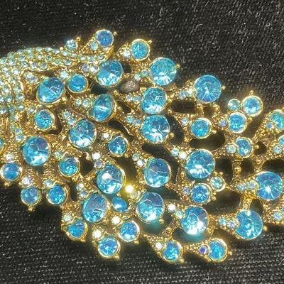 166: XL Gold Tone Blue Crystal Peacock Brooch, 3 in L
