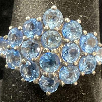 664: Signed Sterling Silver Topaz Cluster Ring
