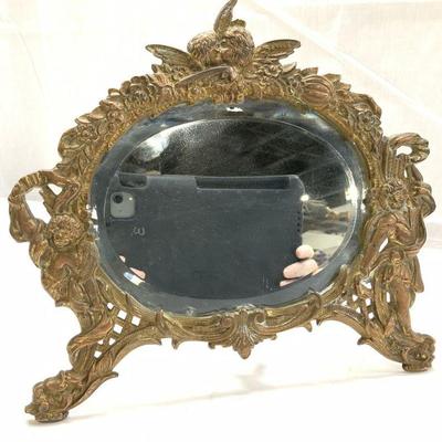 64: Art Nouveau Angel Motif Iron Table Mirror
