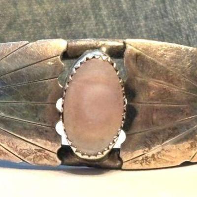 Silver cuff bracelet with pink cabachon