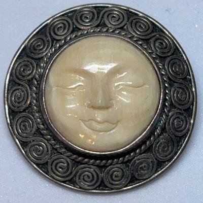 Sterling moon face pendant signed k"
