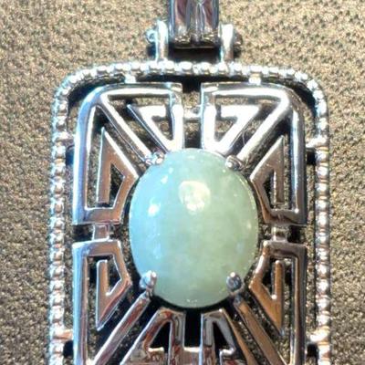 Jadeite pendant set in 14k