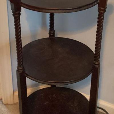 Three tiered dark brown wooden side table