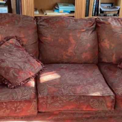 Red overstuffed sofa