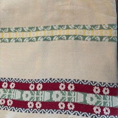 Ivory tablecloth with green and red design