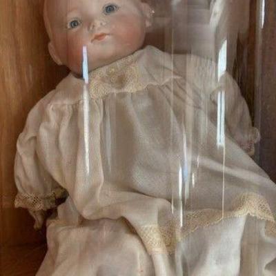Doll in white dress