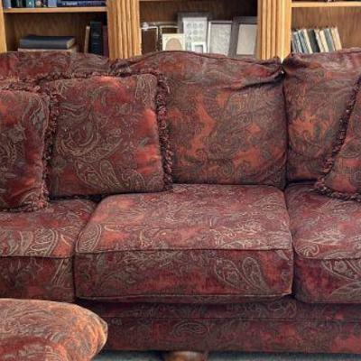 Red floral sofa