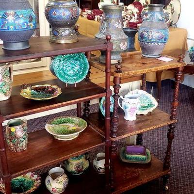 Champleve, majolica and display shelves
