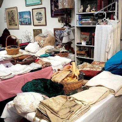 Material remnants, sheer curtain, clothing racks