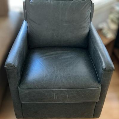 Swiveling Blue Leather Like Chair 