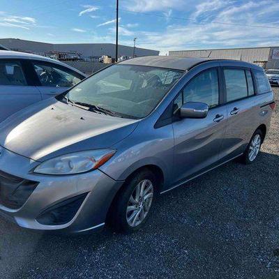 #275 • 2015 Mazda Mazda5 Van, VIN # JM1CW2BL3F0189945
