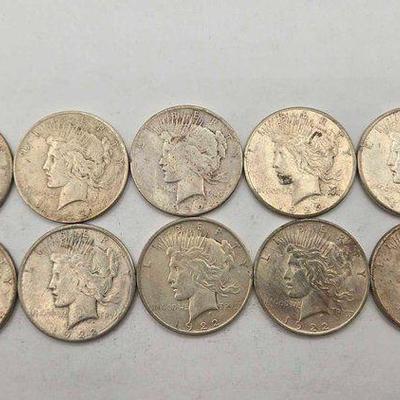 #1304 • (10) 1922 Peace Silver Dollars
