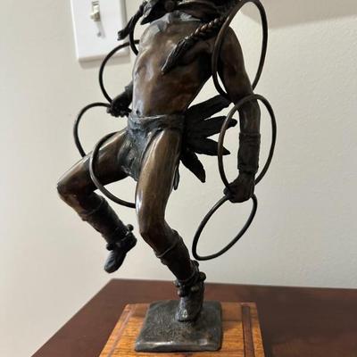 The Hoop Dance bronze statue by Raymond Rogers.