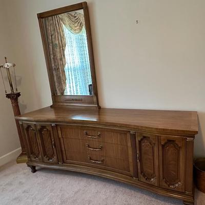 Retro 1970's Curved Dresser with Mirror. Dresser is 80" long x 21" deep x 31" high. Mirror is 29 1/2" wide by 48...