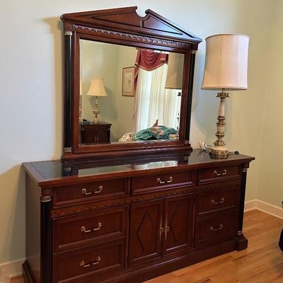 Stanley Furniture Company Dresser with attached Mirror. Mirror is 50" wide x 47" high. Dresser is 72" wide x 20 1/4"...
