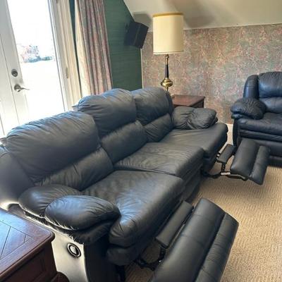 Navy Leather Sofa with Recliners on each end. 86" long x 35" high x 33" deep
