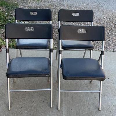 Four Costco Folding Chairs