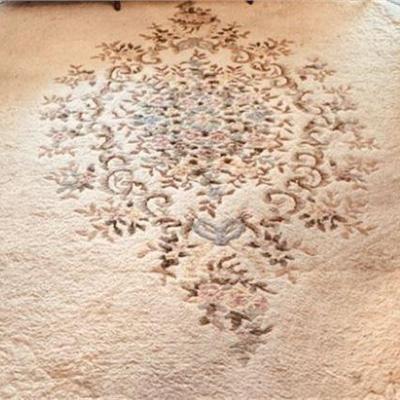 Lot 032-085
Chinese Carved Ivory and Floral Wool Oval Area Rug