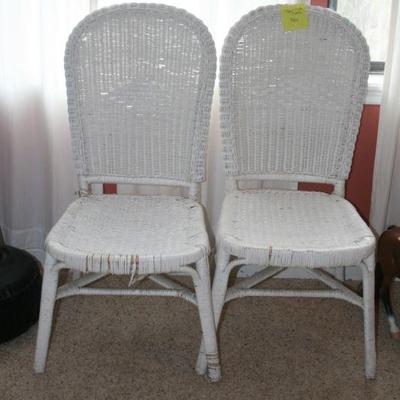 Two White Wicker Chairs