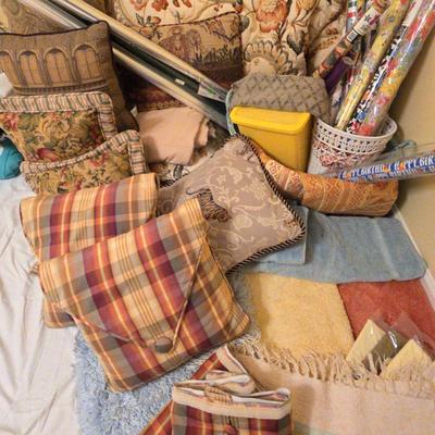 Variety of Decorative Pillows And Bathroom Items