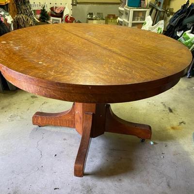 48" Round Oak Pedestal Table On Casters
