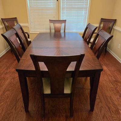 Nice Dining Table with 8 Chairs (includes extra leaf and pads)