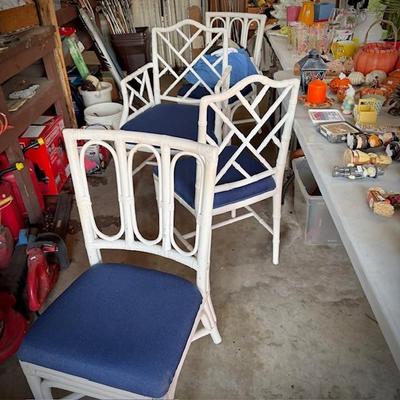 White wicker square table and four chairs