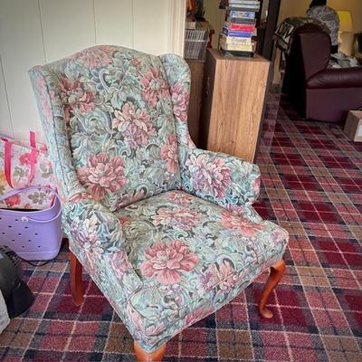 One of two wing back chairs
