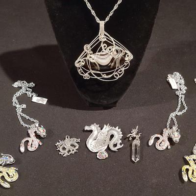 Wire Wrapped Pendant With Other Jewelry 