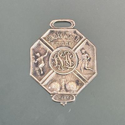 Sterling Silver Golf Medal | Sunday World Field Day, dated 1910, Lamber Bros NY, marked "sterling" on the back; 0.47 ozt. - h....