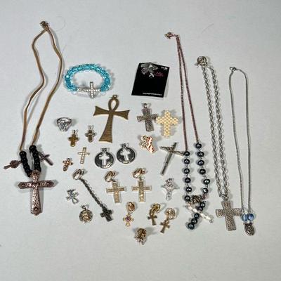 RELIGIOUS JEWLERY | Mixed lot of religious jewelry including; crucifix pendants, bracelets, earrings, angel pendants, saint pendants, and...