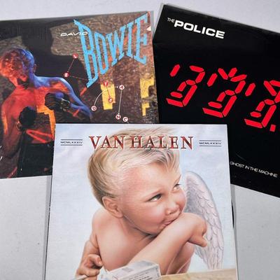 (3pc) MIXED VINYL RECORD ALBUMS | Mixed vinyl record albums including: David Bowie "Lets Dance" (SD-17093) Van Halen...