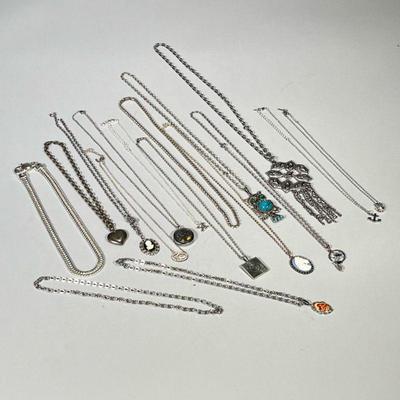 (25pc) STERLING SILVER JEWELRY | Mixed lot of silver-toned costume jewelry necklaces.

