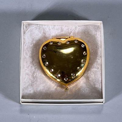 HEART COMPACT | Heart-shaped gold-tone mirror compact. Dimensions: w. 2.25 x l. 2.5 in

