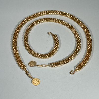 (2pc) PAIR GOLD TONE CHAIN BELTS | Pair of gold-tone mixed medal chain belts with faux French coin on end. Dimensions: l. 36 in