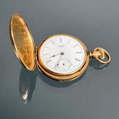 ELGIN HUNTER CASE GOLD-PLATED POCKET WATCH | Yellow gold plated pocketwatch, overall engraved hunter case with townscape on one side and...