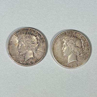 (3pc) 1968 Mexican 25 Peso Silver Olympic Coin | Pair of 1923 United States silver dollar coins; 1.7 ozt. Dimensions: dia. 1.5 in

