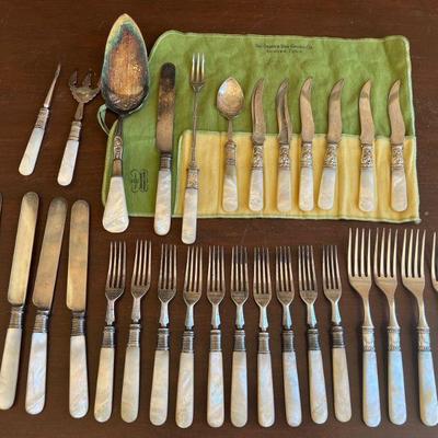 Partial Set Of Silver Plate And Mother Of Pearl Handled Silverware And Serving Pieces 