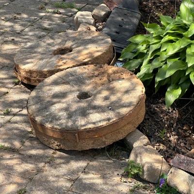 Two millstones, in great condition with matching top and bottom