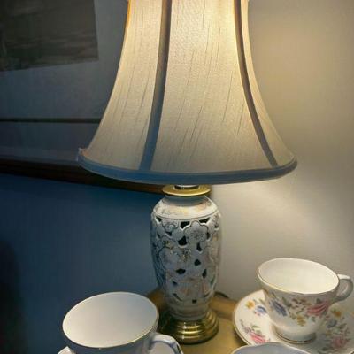 Adorable pierced ceramic and brass boudoir lamp. 
